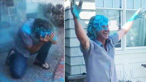 Man with blue powder all over his face.