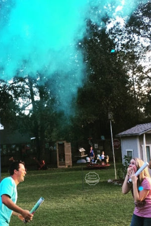 These parents to be are elated to find out they are having a boy by using our blue powder cannons 