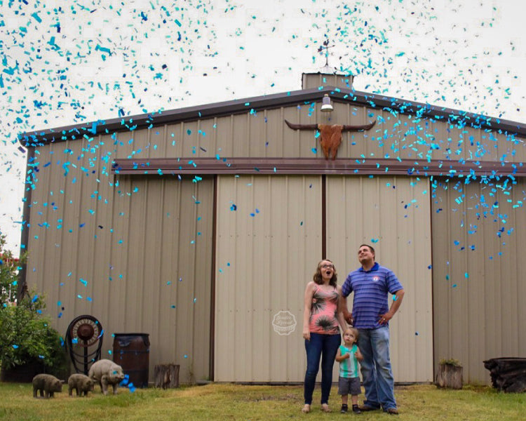 It's another boy! This family is taking in that moment as they are showered with blue confetti cannons